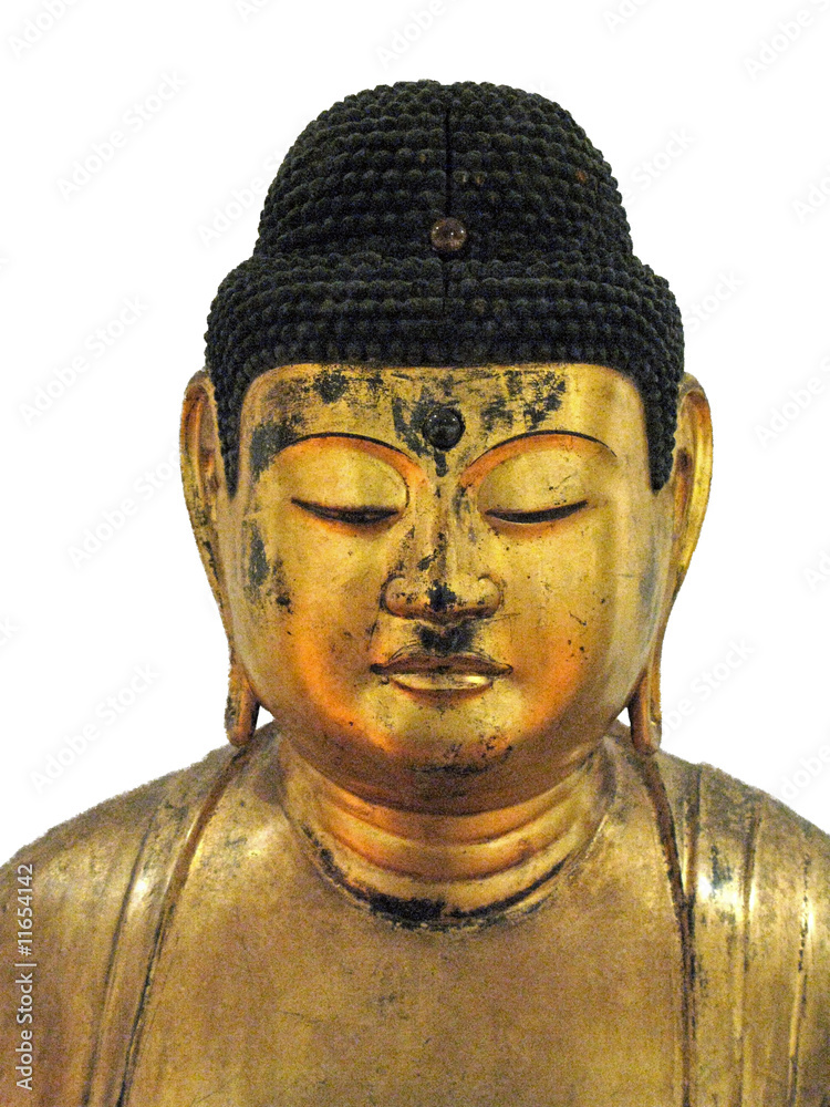 Tête de Bouddha en bois doré. Tête de Bouddha en bois doré.