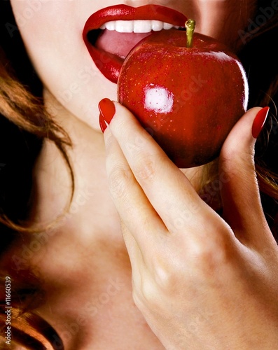 Woman eating apple