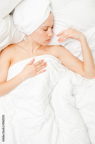delicate picture of beautiful woman in the bed