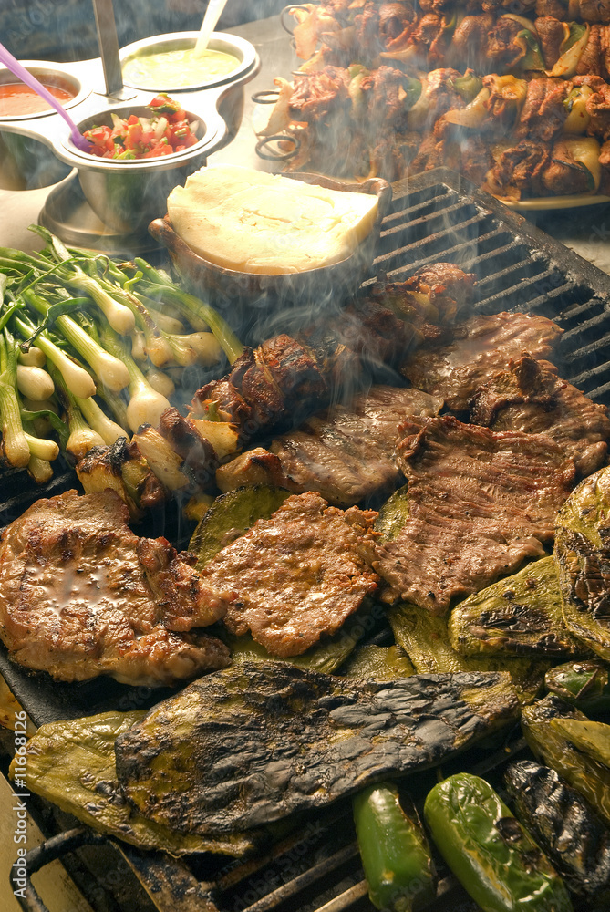 Carne asada a la parrilla con nopales, queso y chiles. México Stock Photo |  Adobe Stock