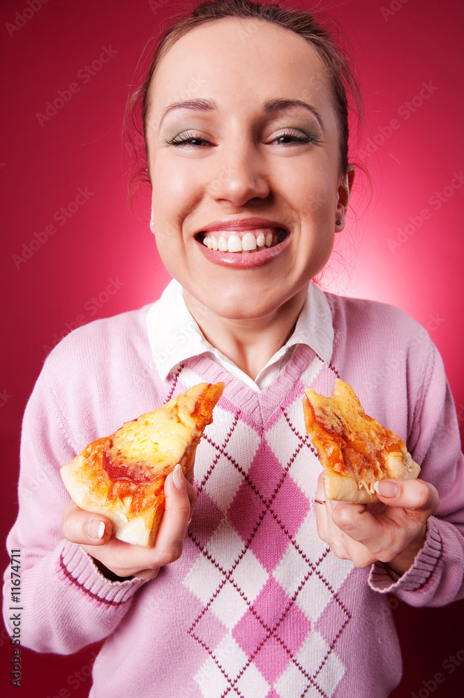 funny girl with two pieces of tasty pizza