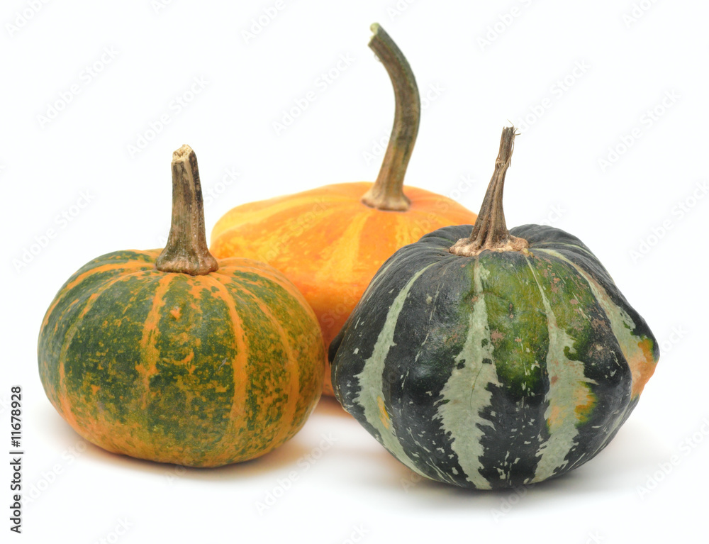 Three fancy pumpkins isolated over white Three fancy pumpkins isolated over white