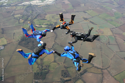 Five Skydivers form a star #11679121