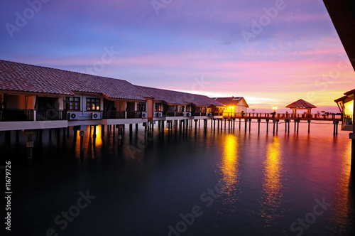 Sunset at the water houses