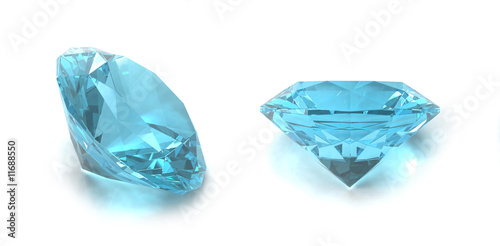 Sky blue topaz gems isolated on white background photo