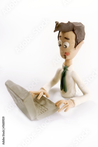 Plasticine handmade businessman with laptop photo