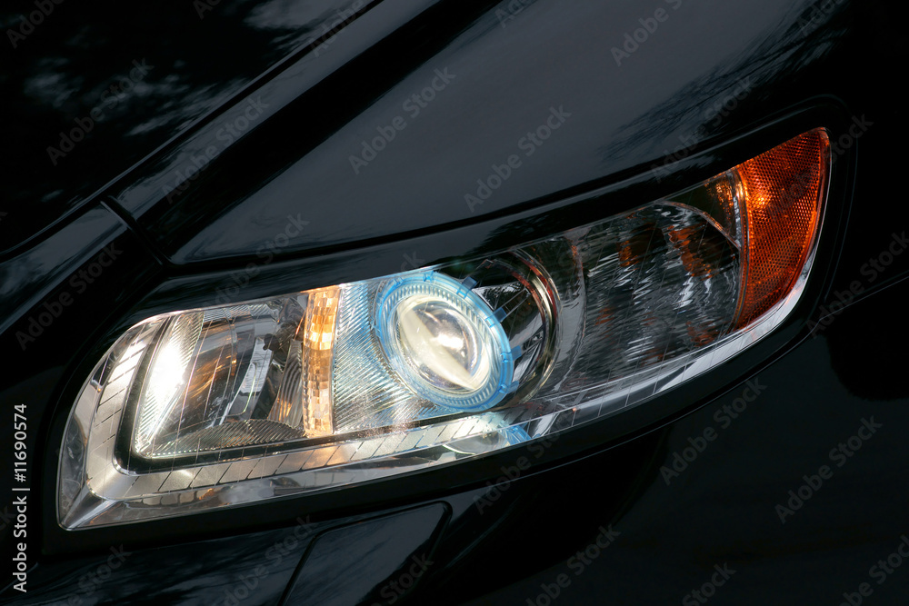 Xenon headlamp of black car