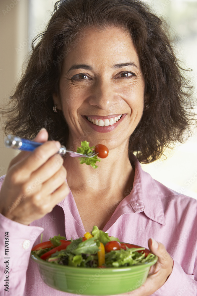 Middle Aged Woman Eating A Salad Middle Aged Woman Eating A Salad