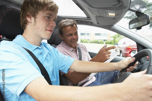 Teenage Boy Taking A Driving Lesson