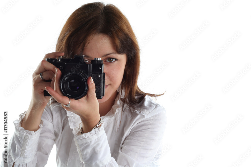 young woman with old camera isolated on white background