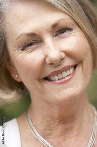 Portrait Of Senior Woman Smiling At Camera