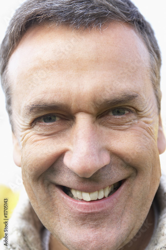Middle Aged Man Smiling At The Camera