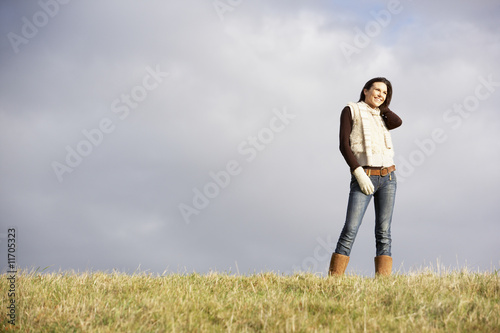 Young Woman Standing In Park © Monkey Business