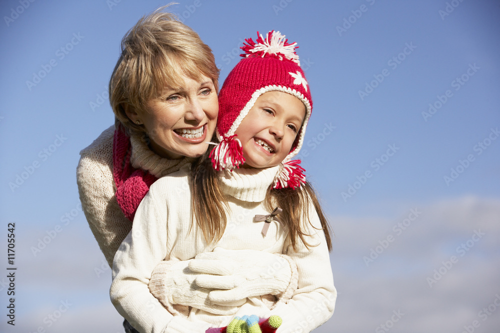 Obraz premium Grandmother Hugging Her Granddaughter