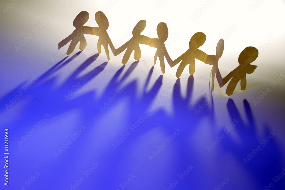 Paper-chain people holding hands Paper-chain people holding hands