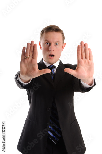 Businessman stopping with hands