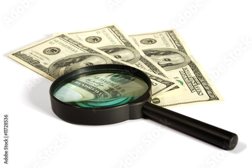 dollars bond under a magnifying glass