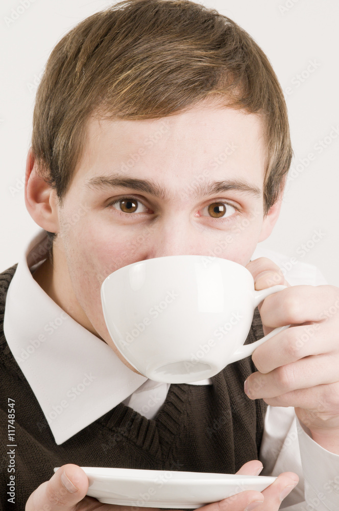 man drink a cup of coffee front man drink a cup of coffee front