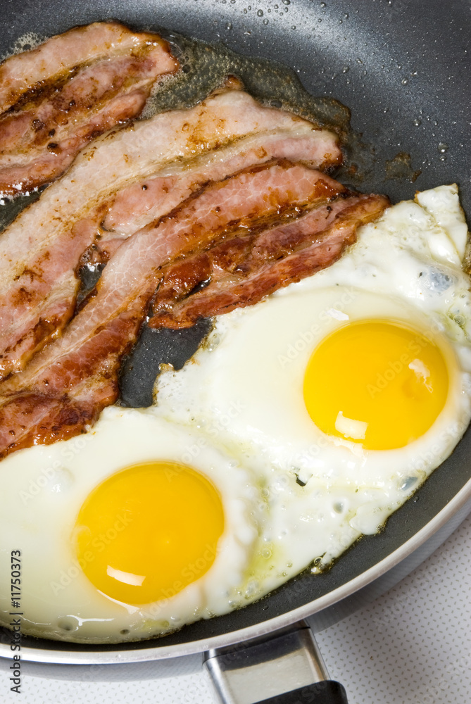 Bacon and Eggs Cooking in a Frying Pan Bacon and Eggs Cooking in a Frying Pan