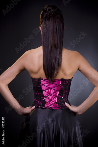 Back of a woman in cocktail dress
