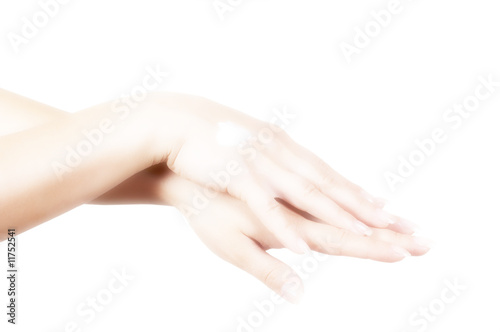 feminine hands and matutinal cream