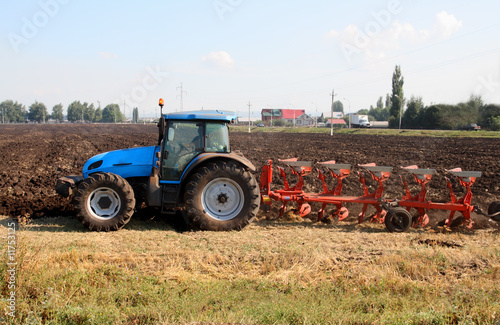 tractor with plough