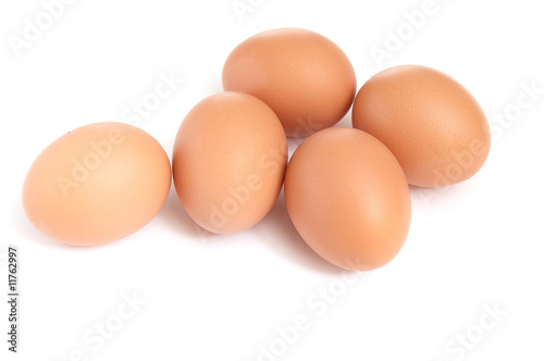 Five eggs on a white background.