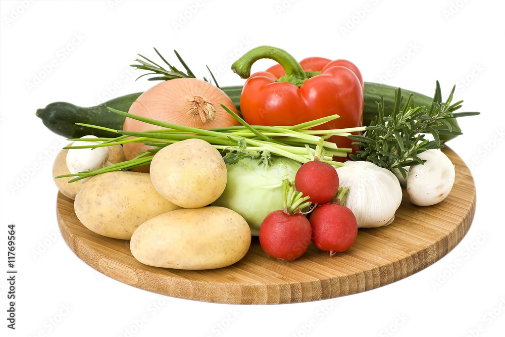 vegetables arranged on a wooden board vegetables arranged on a wooden board