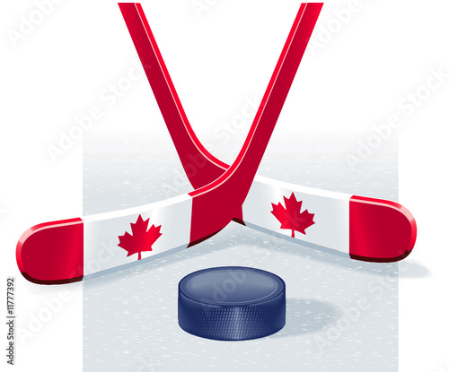 Hockey sticks and puck