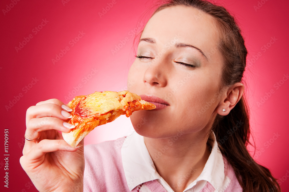 woman eating tasty pizza