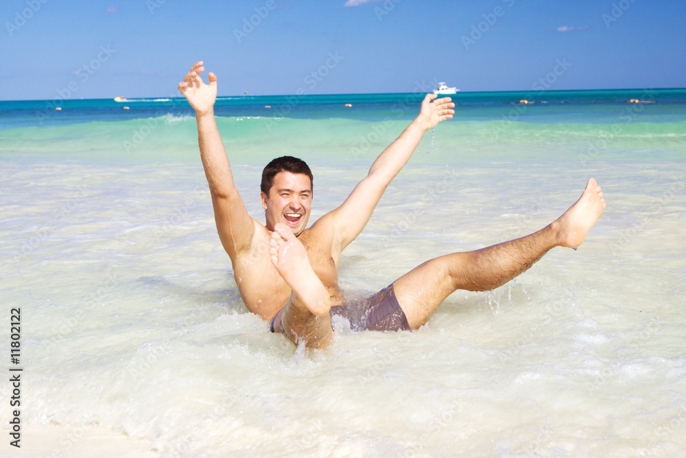 happy man on the beach happy man on the beach