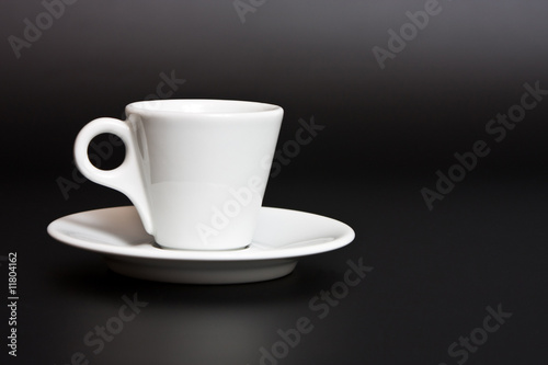 Cup of coffee on a black background