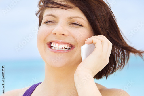 happy woman with white phone
