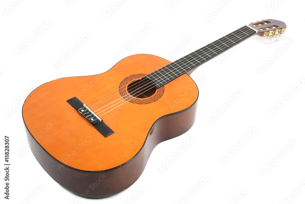 Classical acoustic guitar isolated over white background