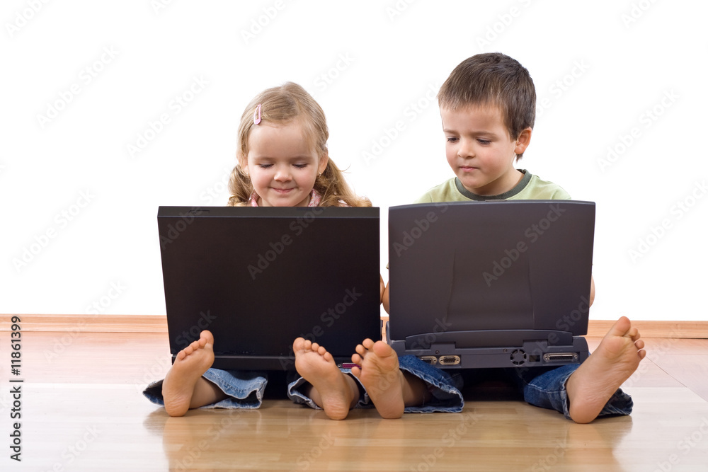 Kids using laptop computers