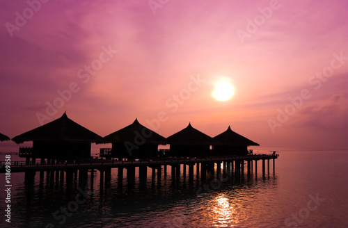 Sunset and water bungalows
