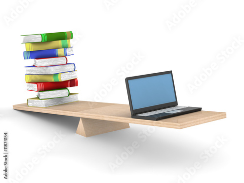 Books and laptop on scales....
