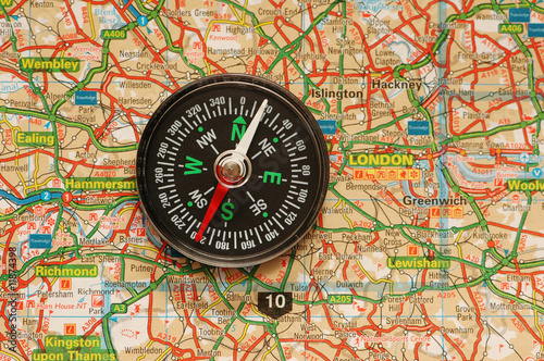 Compass over the map of UK - London suburbs