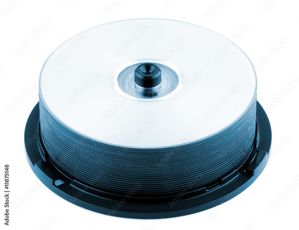 CD or DVD discs on a spindle. Blue toned. CD or DVD discs on a spindle. Blue toned.