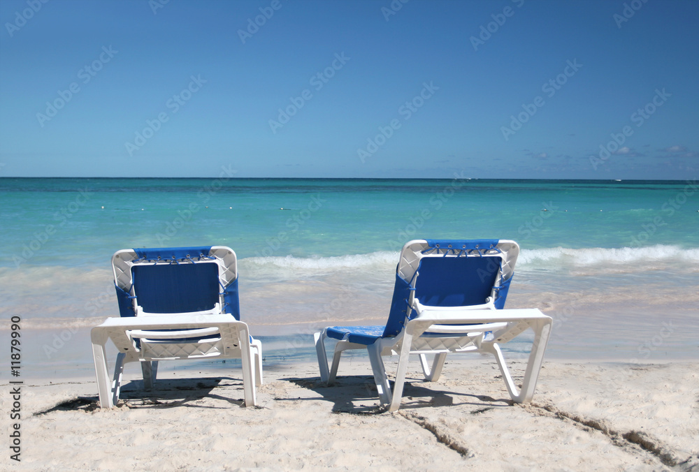 Tropical Paradise - Two Beach Chairs on White Sand Beach and Oce Tropical Paradise - Two Beach Chairs on White Sand Beach and Oce
