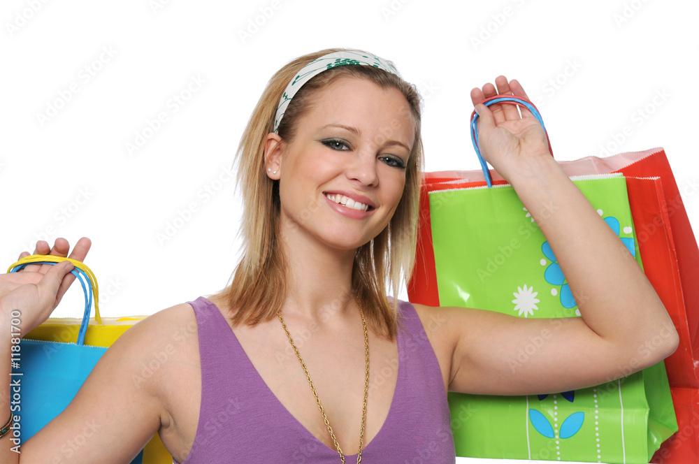 beautiful smiling teen girl with shopping bags
