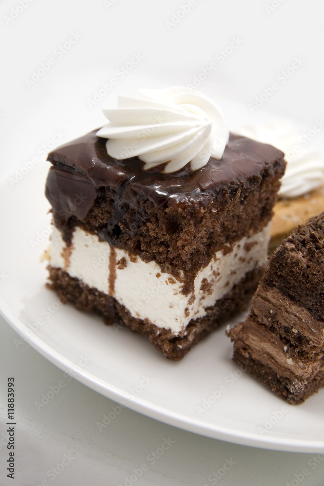 Two chocolate cakes p on white background Two chocolate cakes p on white background