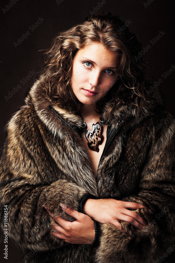Romantic girl wearing fur jacket Romantic girl wearing fur jacket