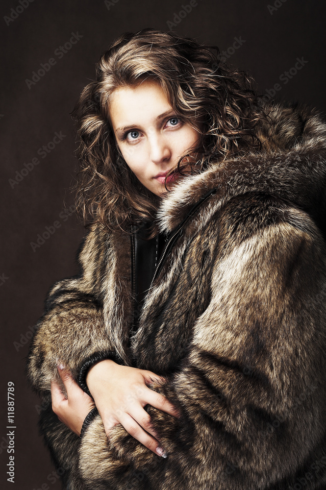 Romantic girl wearing fur jacket Romantic girl wearing fur jacket