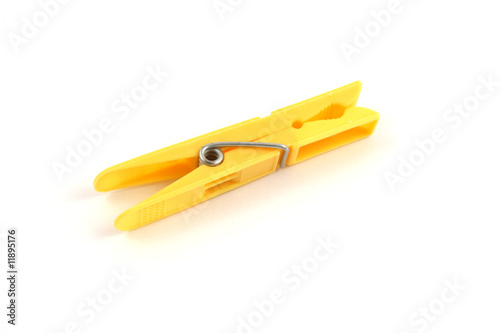 yellow plastic clothes peg photo