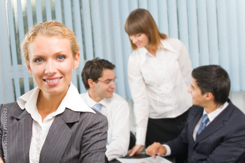 Portrait of successful businesswoman and business team Portrait of successful businesswoman and business team