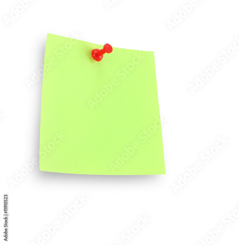green note pad reminder on wall with clipping path