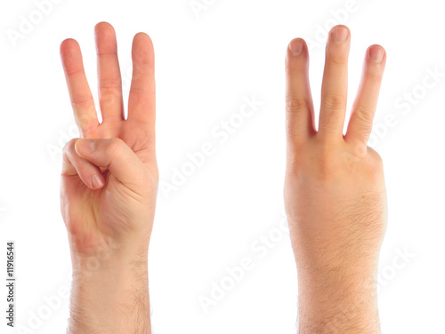 Male hands counting number 3