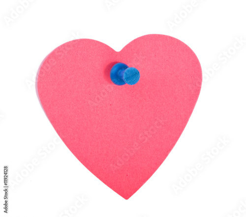 Red heart shaped note paper with blue pin © utflytter