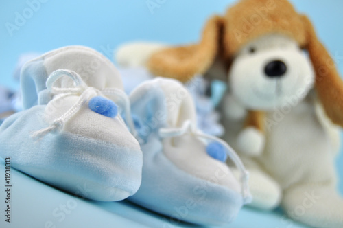 Blue Baby Sleepers and Toy Dog
